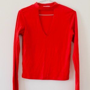 Long-sleeve shirt with cut-out